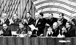 В ходе XX съезда КПСС Хрущёв выступает с докладом о разоблачении культа личности Сталина. Выражение «культ личности Сталина» получило широкое распространение после появления в 1956 в докладе Н. С. Хру